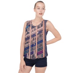 Low Angle Photography Of Beige And Blue Building Bubble Hem Chiffon Tank Top by Pakrebo