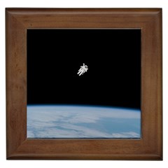 Astronaut Floating Above The Blue Planet Framed Tiles by Nexatart